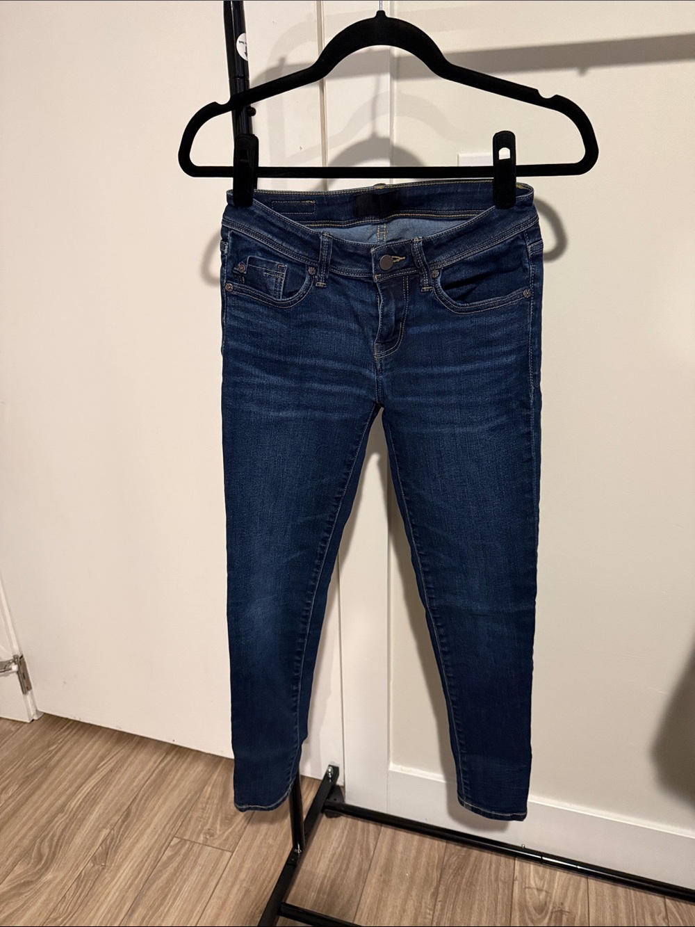 Buckle Black Skinny Jeans in Dark Indigo Blue